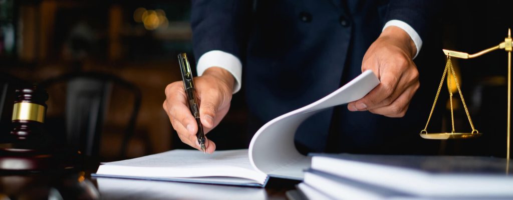 Person Signing Paperwork